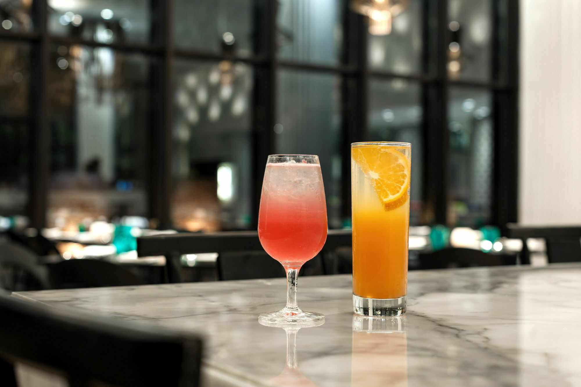 Hyatt Centric Candolim Goa Kültér fotó A pink and an orange cocktail